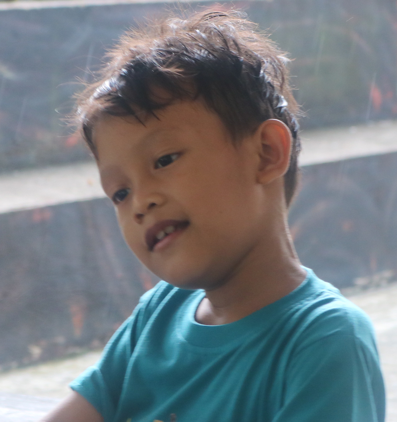 Syamil with the big bear