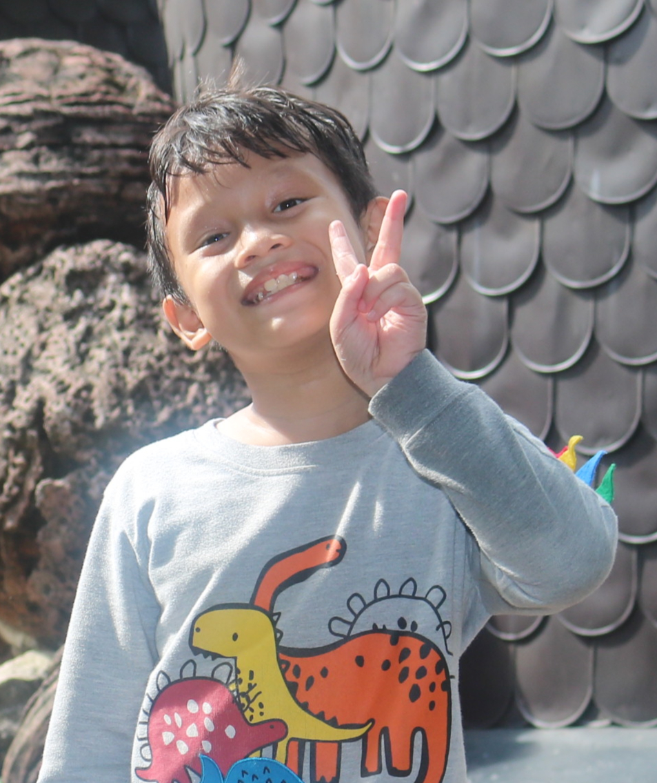 Syamil with a very bright smile