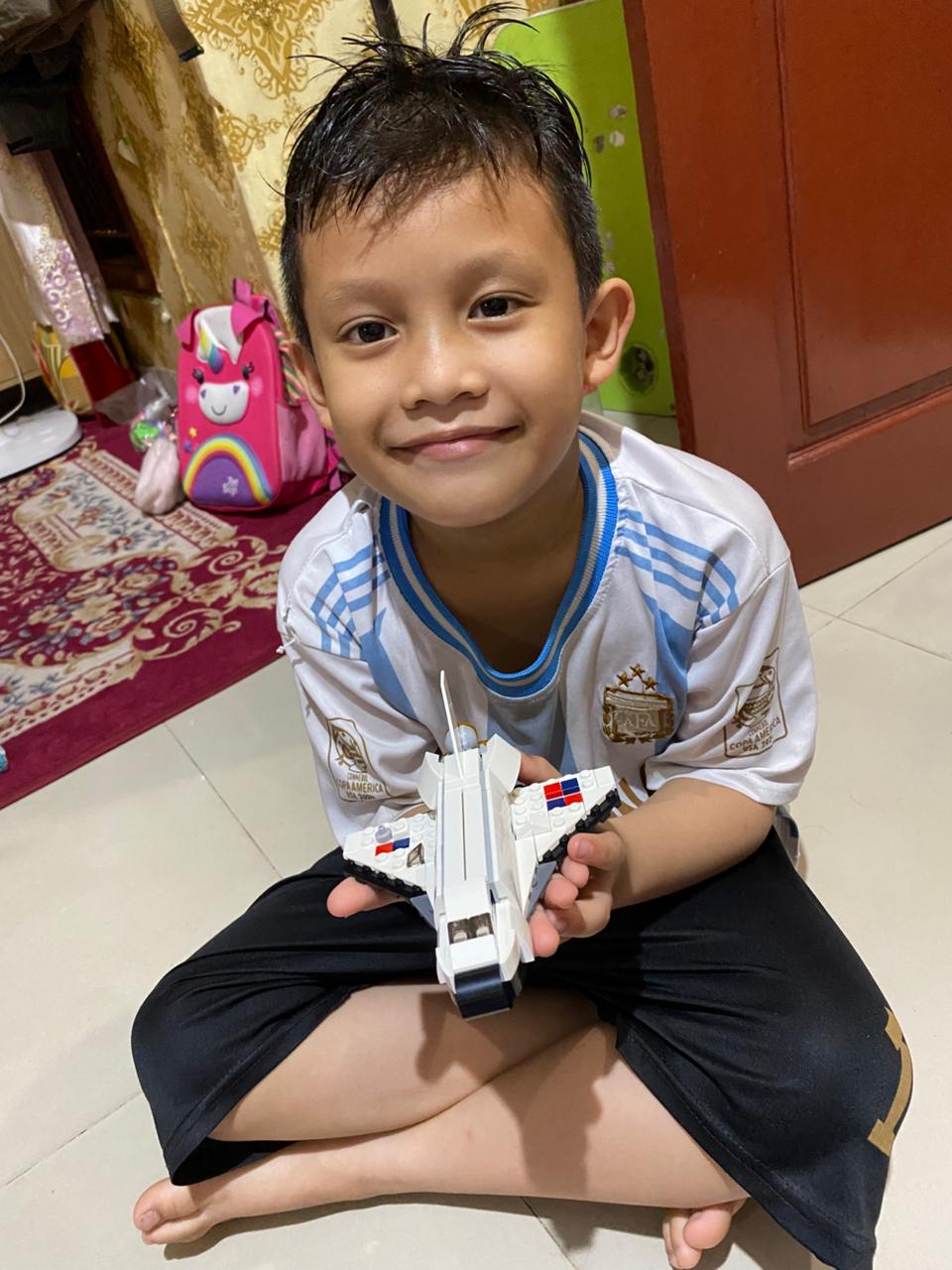Syamil with his Lego