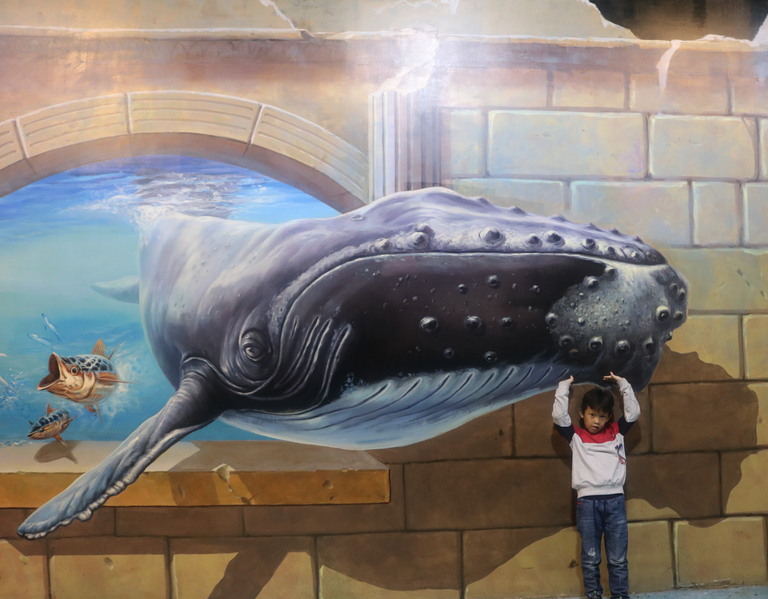 Syamil with a giant whale