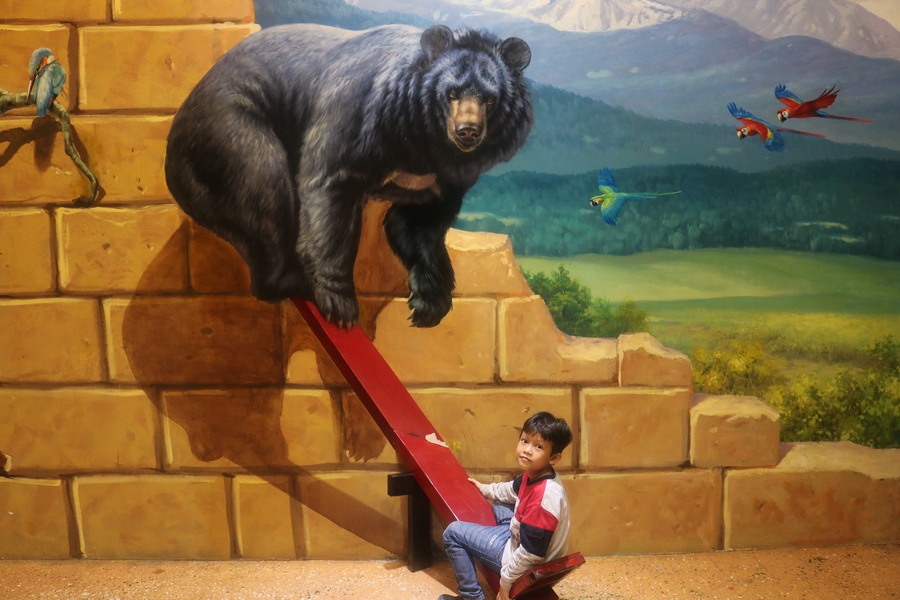 Syamil in a swimming shirt